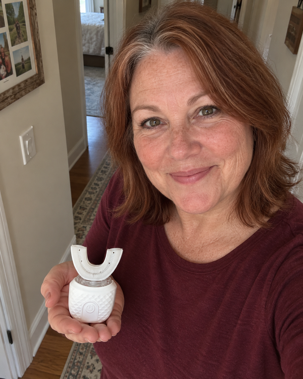 AI-generated lifestyle image of an older adult holding U Brush